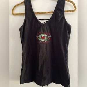 Black sleeveless tshirt from 2013 BIKE WEEK. Shirt is laced in back.
